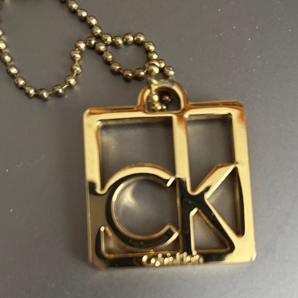 Calvin Klein gold-tone CK Logo Bag Charm - Picture 2 of 3